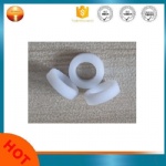 Thin section bearing PTFE spacer ring